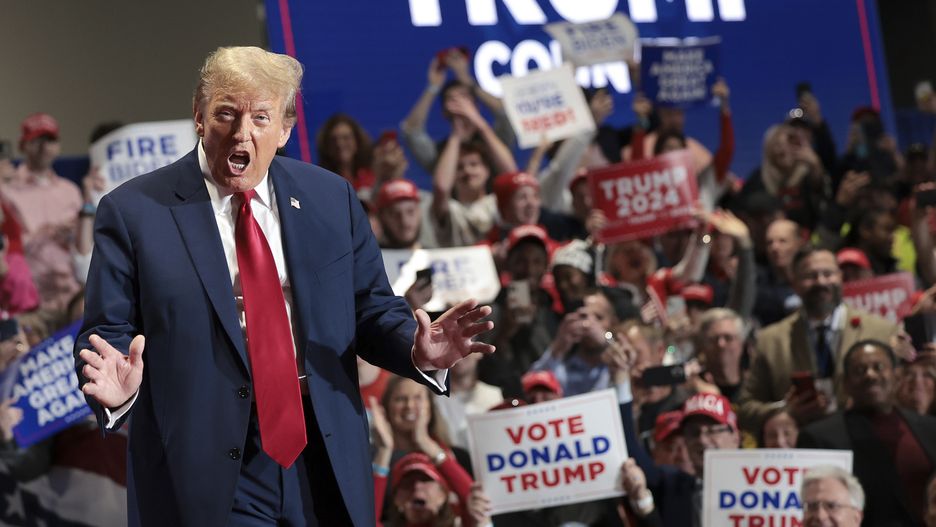 RICHMOND, VIRGINIA - MARCH 02: Republican presidential candidate and former President Donald Trump reacts to supporters as he arrives on stage at a Get Out the Vote Rally March 2, 2024 in Richmond, Virginia. Sixteen states, including Virginia, will vote during Super Tuesday on March 5. (Photo by Win McNamee/Getty Images)