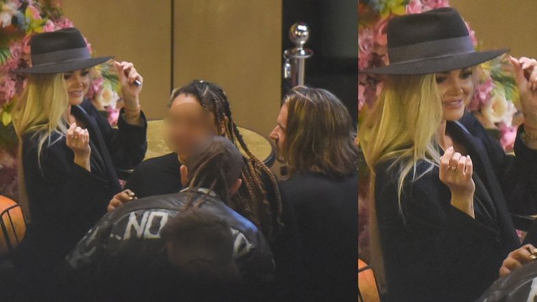 Piotr Stramowski i Edyta Folwarska wymieniają czułości na imprezie