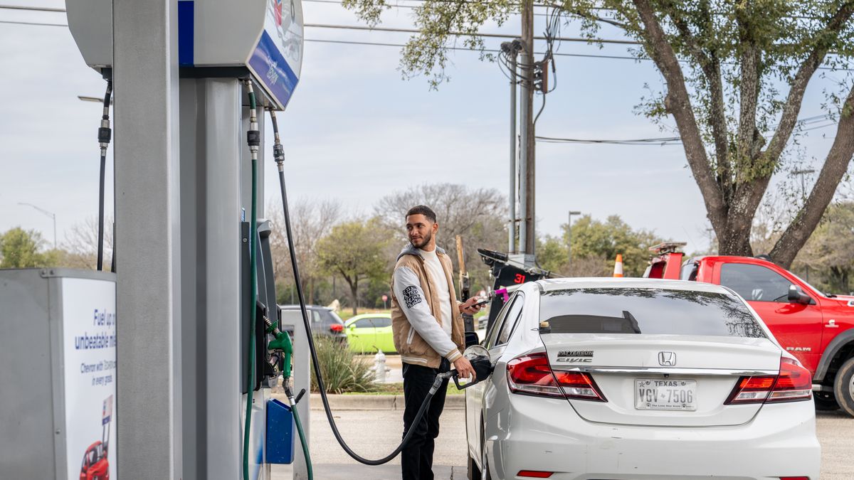 AUSTIN, TEXAS - FEBRUARY 13: A customer pumps gas at a Chevron gas station on February 13, 2025 in Austin, Texas. Climbing oil prices are projected to lead to a further increase in gas prices nationwide. Analysts are attributing the rising costs in part to inflation, refineries undergoing maintenance work and President Trump's more aggressive posture on Iran, after announcing plans to revive the “maximum pressure” campaign against the country, which seeks to bring Iran's crude oil sales to zero. (Photo by Brandon Bell/Getty Images)
