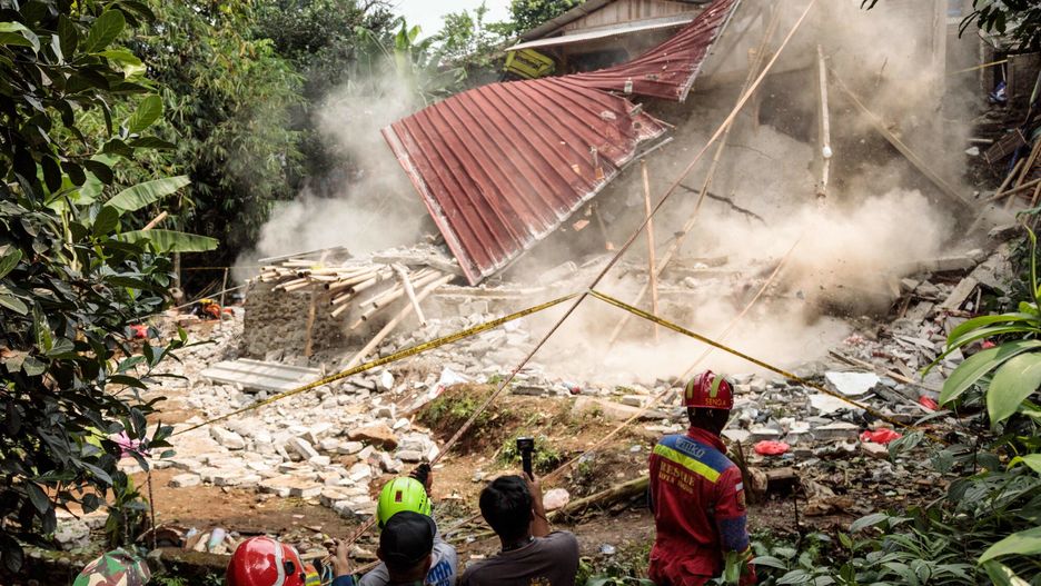 Temporary
Rescue teams pull down unstable remains of a community Islamic study hall building with ropes after it collapsed while female Muslims were conducting studies to commemorate the birthday of the Prophet Muhammad, in Bogor, West Java, on September 7, 2025. According to the Regional Disaster Management Agency (BPBD), three women were killed and 65 others injured as rescue teams from the agency, police, army and volunteers responded. (Photo by ADITYA AJI / AFP)
ADITYA AJI