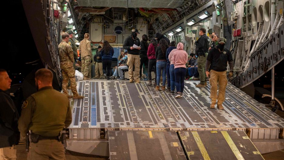 Temporary
This image released by the Department of Defense shows US Airmen and US Customs and Border Protection Agents guide undocumented migrants onto a e C-17 Globemaster III at the Tucson International Airport, Arizona, January 23, 2025. Under the direction of US Northern Command, US Transportation Command is supporting Immigration and Customs Enforcement removal flights by providing military airlift. (Photo by Devlin Bishop / DVIDS / AFP) / RESTRICTED TO EDITORIAL USE - MANDATORY CREDIT "AFP PHOTO / DVIDS / Department of Defense / Senior Airman Devlin Bishop " - NO MARKETING NO ADVERTISING CAMPAIGNS - DISTRIBUTED AS A SERVICE TO CLIENTS
DEVLIN BISHOP