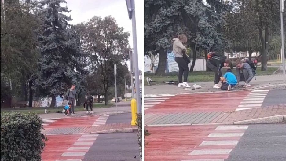 Chłopcy pomagają dziecku zbierać kasztany