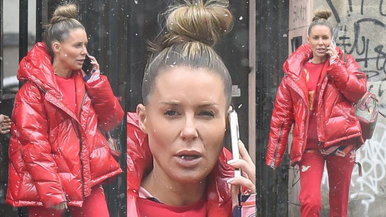 Małgorzata Rozenek cała na czerwono stroi groźne miny, czekając na taksówkę 