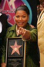 Queen Latifah adoptuje