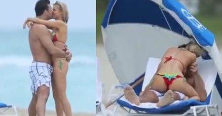 Krupa całuje Romaina na plaży