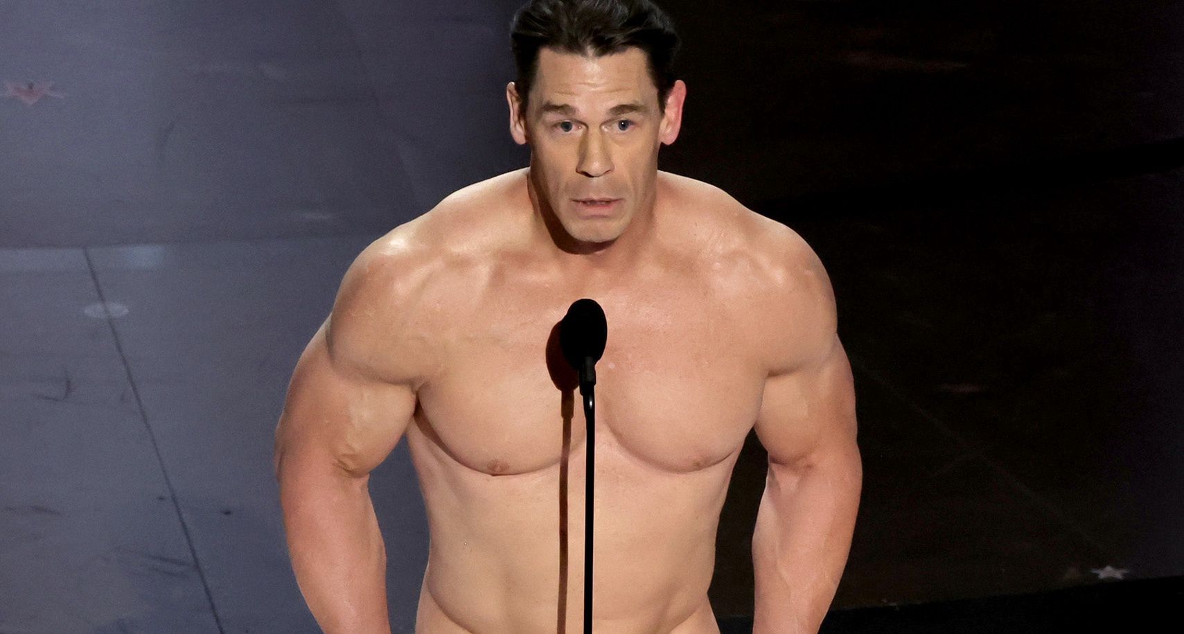 96th Annual Academy Awards - ShowHOLLYWOOD, CALIFORNIA - MARCH 10: John Cena speaks onstage during the 96th Annual Academy Awards at Dolby Theatre on March 10, 2024 in Hollywood, California. (Photo by Kevin Winter/Getty Images)Kevin Winter
