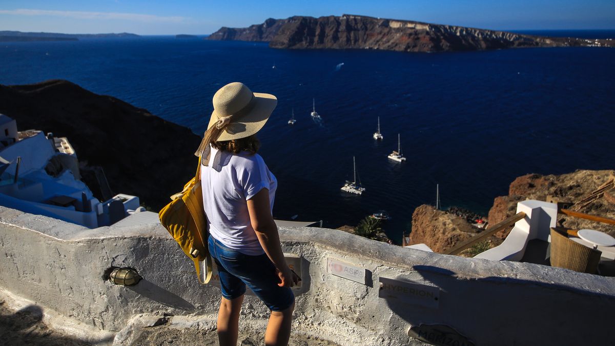 SANTORINI, GREECE - OCTOBER 15: A view from Santorini Island, one of the most famous islands in the world with its traditional architecture, houses made of stones unique to the region, in Santorini, Greece on October 15, 2024. The island, which attracts attention with its settlement built on the cliffs, can be reached by cable car or by climbing a 657-step stairway after travelling by sea. (Photo by Ummu Nisan Kandilcioglu/Anadolu via Getty Images)