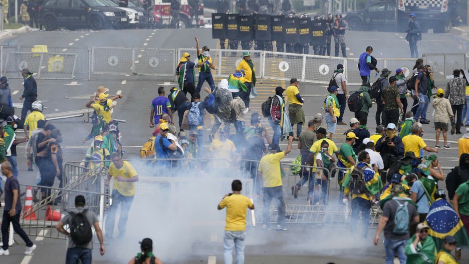 Temporary
Protesters, supporters of former President Jair Bolsonaro, clash with police during a protest outside the Planalto Palace building in Brasilia, Brazil, Sunday, Jan. 8, 2023. Others demonstrators stormed congress and the Supreme Court. (AP Photo/Eraldo Peres)
Eraldo Peres