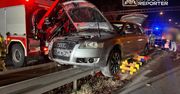 Warszawa. Audi zawisło na barierkach. Zderzenie z pojazdem przewożącym odpady na Bemowie