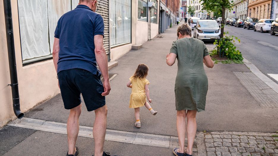 Grandparents and granddaughter walking on the sidewalkGrandparents and their granddaughter enjoy a bright and sunny day as they walk on the sidewalk. They skip and hop along the way. The grandparents try to keep up with their grandchild's playful pace.Morten Falch Sortland
