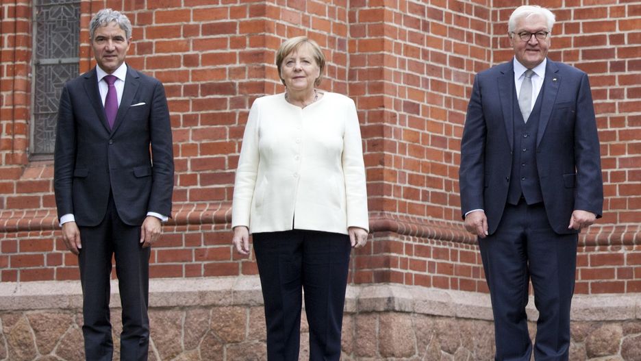 HALLE, GERMANY - OCTOBER 03: President of the Federal Constitutional Court Stephan Harbarth (from left), Chancellor Angela Merkel, Federal president Frank-Walter Steinmeier, President of the Bundestag, Wolfgang Schäuble and Prime Minister of Saxony-Anhalt, Reiner Haseloff pose together during celebrations to mark Unity Day on October 3, 2021 in Halle, Germany. Unity Day marks the reunification of Germany in 1990 following its division between West Germany and East Germany during the Cold War. (Photo by Johannes Stein - Pool/Getty Images)