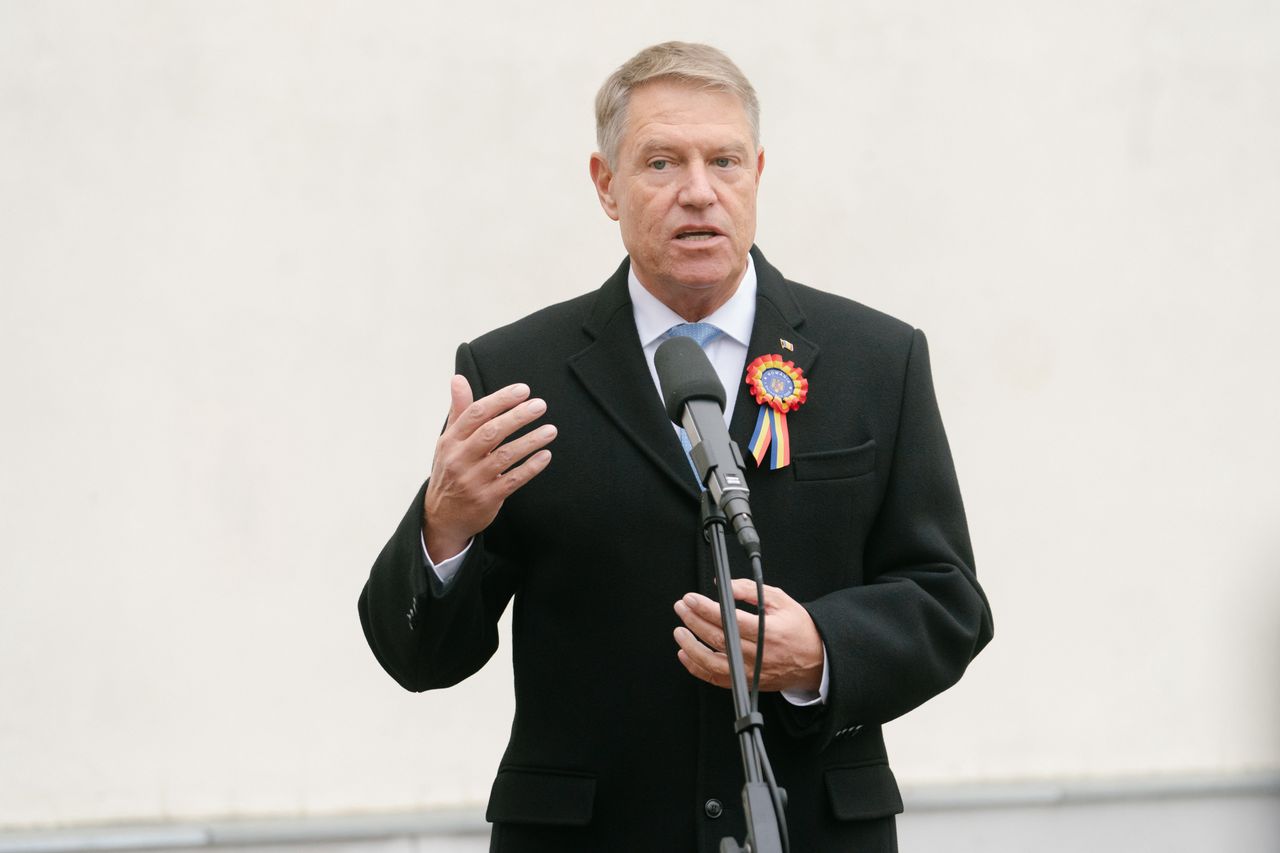 Klaus Iohannis, Romania's president, speaks outside a polling station during parliamentary elections, in Bucharest, Romania, on Sunday, Dec. 1, 2024. In the final days before Romania's parliamentary elections this weekend, the governing parties' leaders both quit, pollsters gave up on projecting the results and the nation's top court cast serious doubt on the integrity of the voting process. Photographer: Andrei Pungovschi/Bloomberg via Getty Images