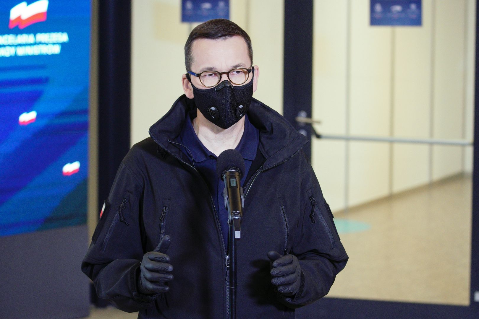 Prime Minister Mateusz Morawiecki is seen during a press conference at the temporary field hospital in the National Stadium in Warsaw, Poland on October 29, 2020. Prime Minister Mateusz Morawiecki together with Minister of Healt Adam Niedzielski and medical director Artur Zaczynski on Thursday visited the field hospital at the National Stadium in Warsaw. The temporary hospital will provide 500 beds to COVID-19 patients to help alleviate demands on regular hospitals amid shaprly rising cases of infections. (Photo by Jaap Arriens/NurPhoto via Getty Images)
