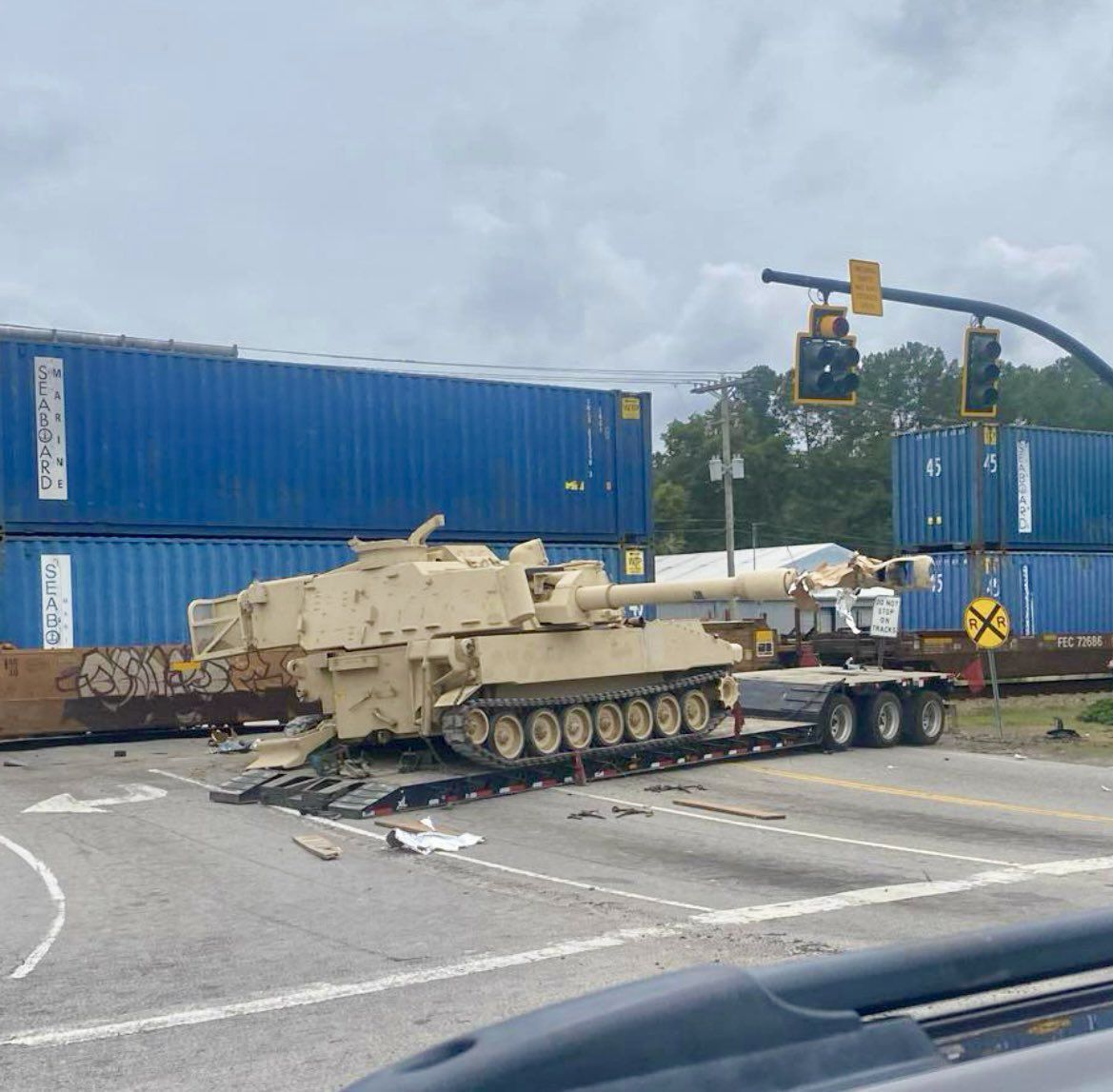 M109 howitzer in fiery collision: Freight train vs military trailer