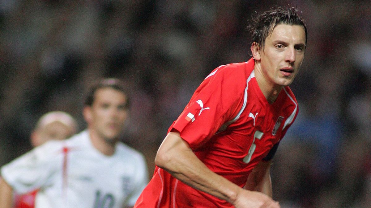 MANCHESTER, ENGLAND - October 12: Jacek Bak of Poland running during the World Cup Qualifier match between England and Poland at Old Trafford on October 12, 2005 in Manchester, England. (Photo by Paul Mcfegan/Sportsphoto/Allstar via Getty Images)