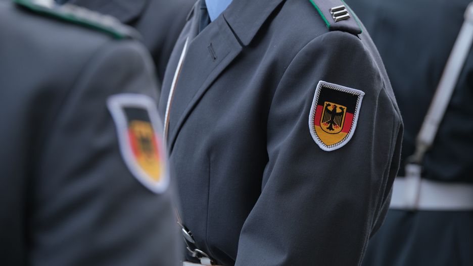 BERLIN, GERMANY - NOVEMBER 12: Members of the Bundeswehr, the German armed forces, prepare to participate in a ceremony in which new recruits took their oath of service in front of the Reichstag on November 12, 2019 in Berlin, Germany. Public oath takings by hundreds of new Bundeswehr recruits are taking place across Germany today. (Photo by Sean Gallup/Getty Images)