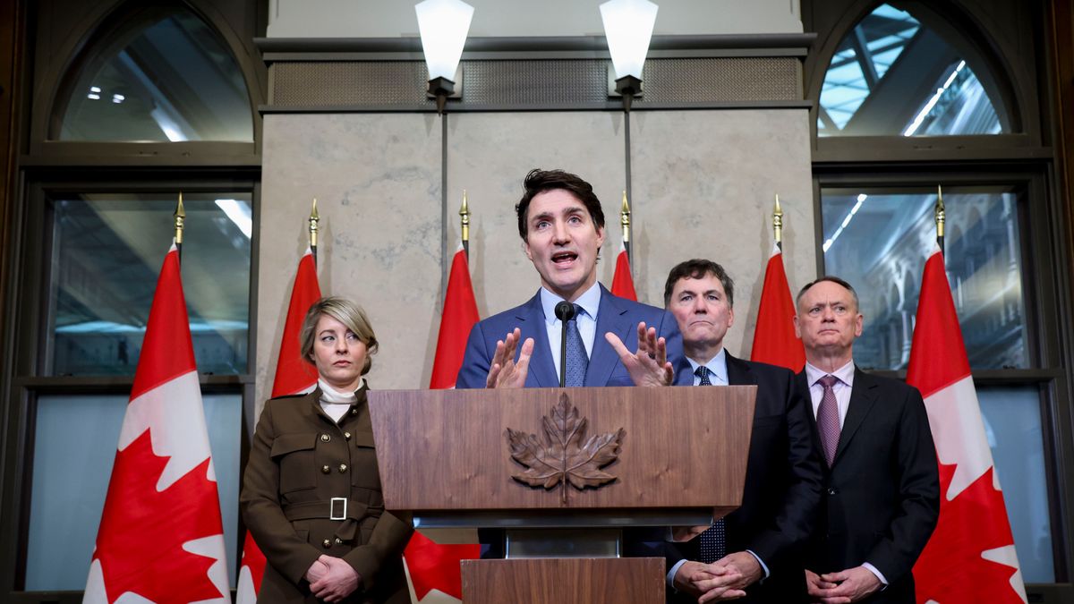 Melanie Joly, Canada's foreign minister, from left, Justin Trudeau, Canada's prime minister, Dominic LeBlanc, Canada's finance and intergovernmental affairs minister, and David McGuinty, Canada's minister of public safety, during a news conference in Ottawa, Ontario, Canada, on Tuesday, March 4, 2025. US President Donald Trump delivered on his threat to hit Canada with sweeping import levies spurring swift reprisals that plunged the world economy into a deepening trade war. Photographer: David Kawai/Bloomberg via Getty Images