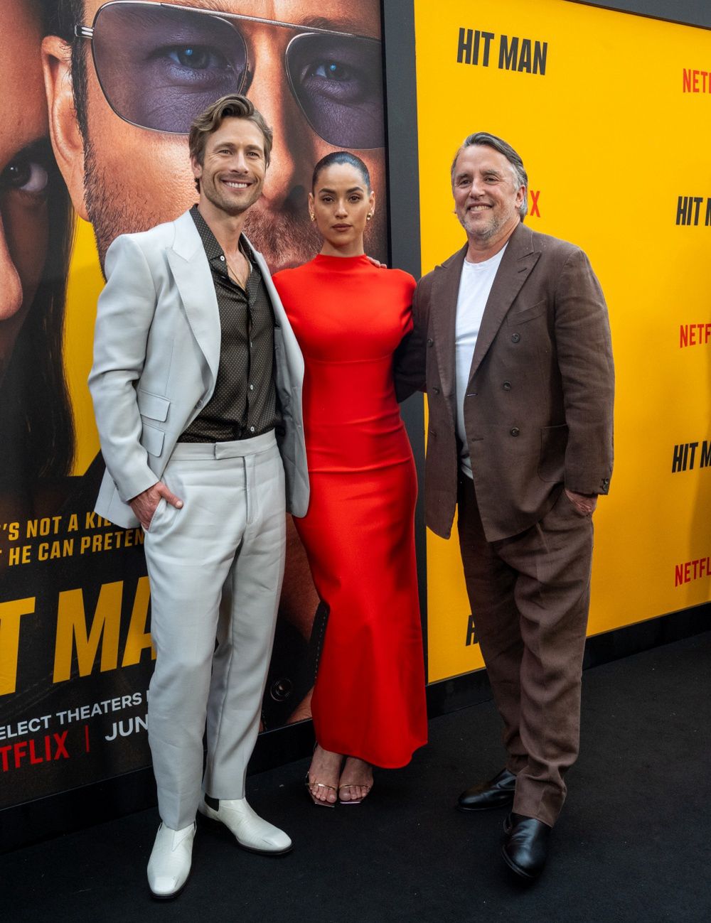 Glen Powell, Adria Arjona i Richard Linklater podczas premiery "Hit Mana"