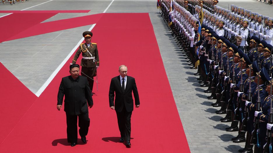 PYONGYANG, NORTH KOREA- JUNE 19 (RUSSIA OUT) Russia's President Vladimir Putin (R) and North Korean Supreme Leader Kim Jong Un (L) attend a welcoming ceremony before Russian-North Korean talks, June 19, 2024 in Pyongyang, North Korea. Russian President Vladimir Putin was in North Korea for a two-day diplomatic visit. (Photo by Contributor/Getty Images)