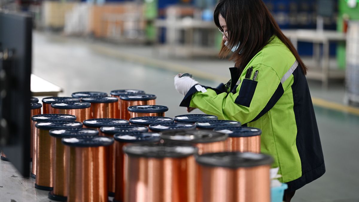 SUQIAN, CHINA - MARCH 6, 2025 - A worker produces copper-clad aluminum enamelled wire to supply overseas markets in a workshop at a factory in Suqian, Jiangsu province, March 6, 2025. (Photo credit should read CFOTO/Future Publishing via Getty Images)