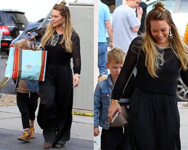 Hilary Duff zasłania synka torbą