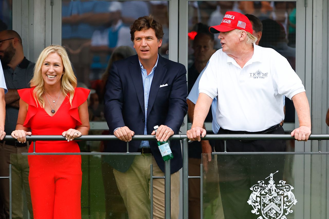 BEDMINSTER, NJ - JULY 31:  Former President Donald Trump, Tucker Carlson and Marjorie Taylor Greene during the 3rd round of the LIV Golf Invitational Series Bedminster on July 31, 2022 at Trump National Golf Club in Bedminster, New Jersey.
(Photo by Rich Graessle/Icon Sportswire via Getty Images)