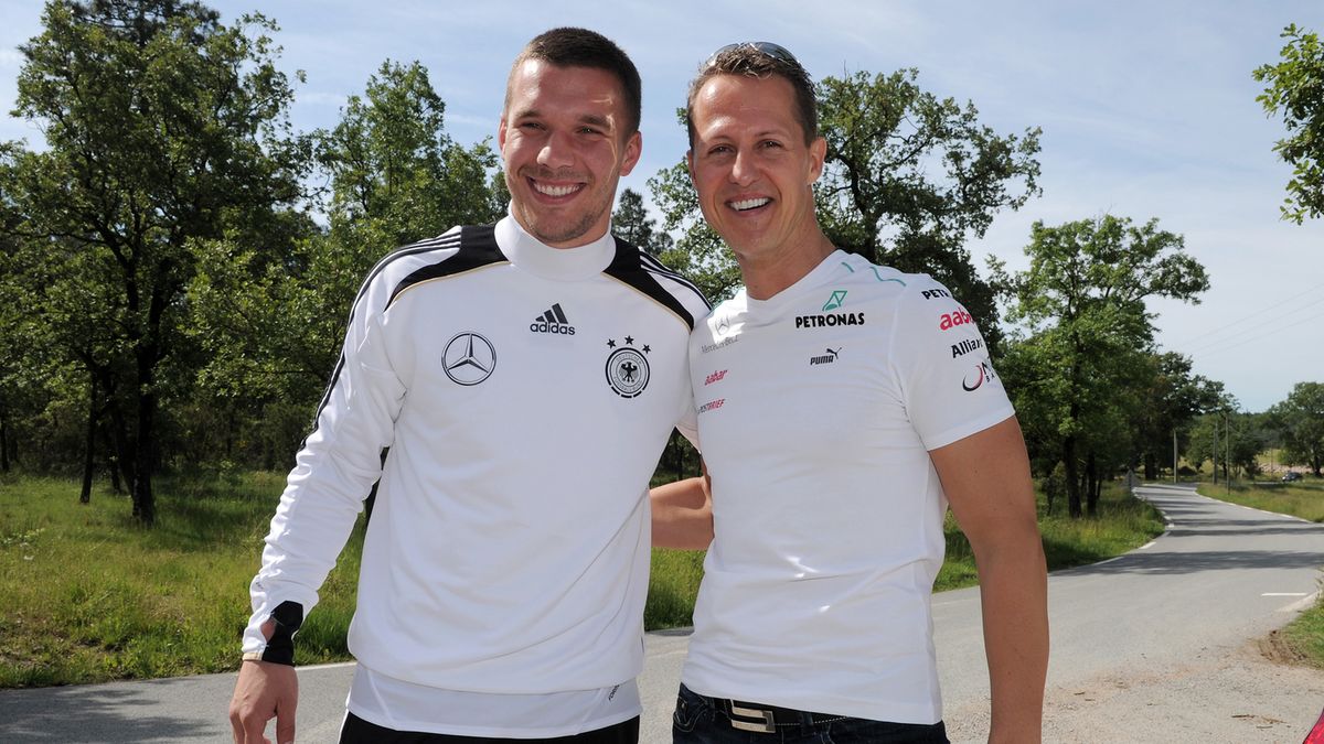 Lukas Podolski (z lewej) i Michael Schumacher