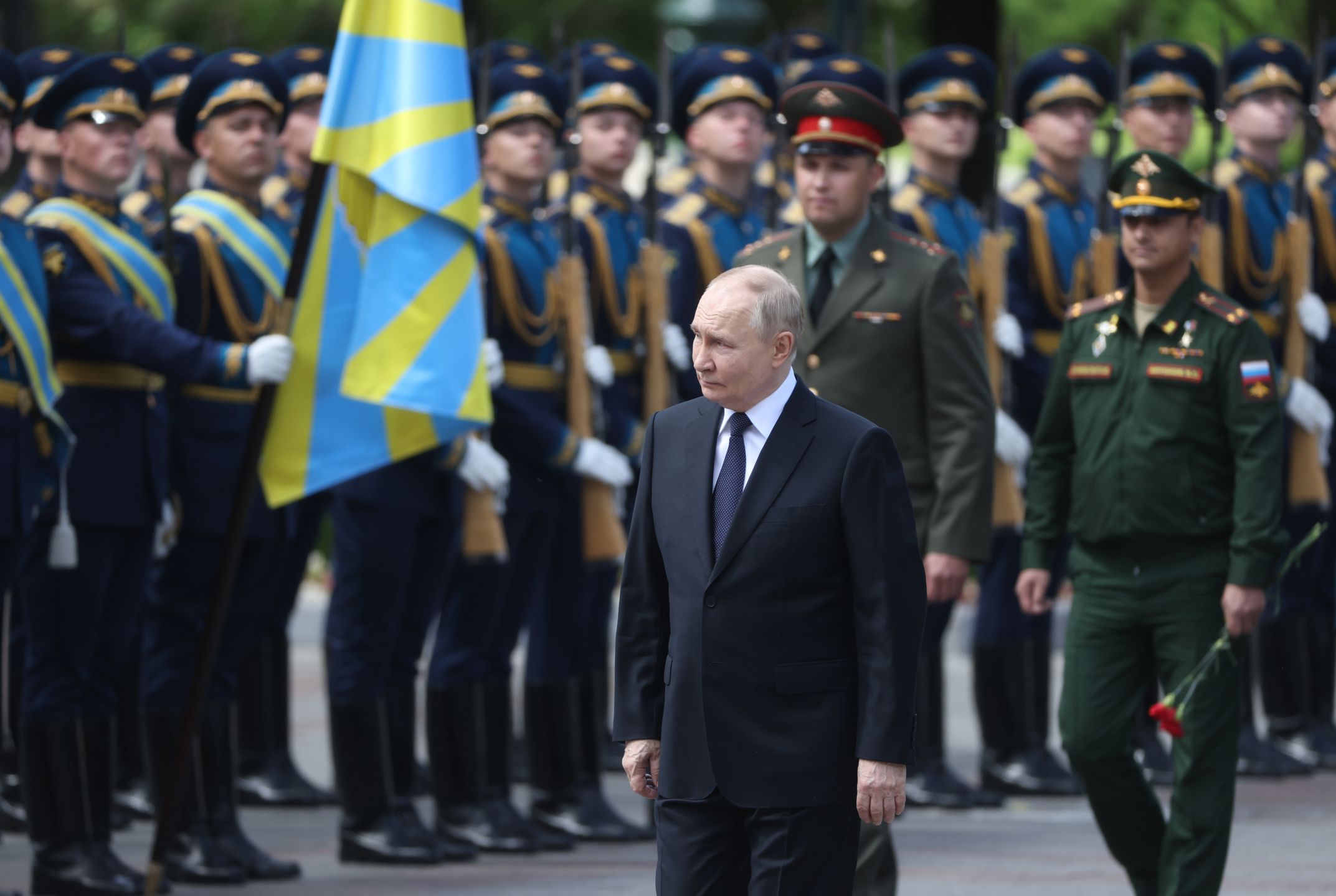 MOSCOW, RUSSIA - JUNE 22 (RUSSIA OUT) Russian President Vladimir Putin (C) looks at Russian Army's officers during a wreath laying ceremony at the Unknown Soldiers's Tomb near the Kremlin, marking the Day of Remembrance and Sorrow, on June 22, 2024, in Moscow, Russia. Russians and Belarusians mark  June 22nd as the anniversary of Nazi Germanys invasion of USSR in 1941. (Photo by Contributor/Getty Images)