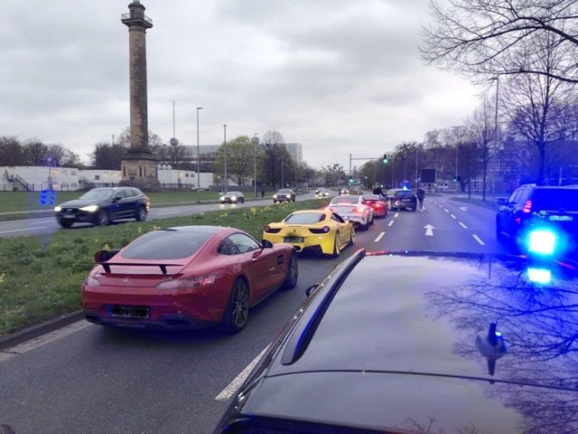 Sports cars on the street in Hanover, unmarked cars of the German police