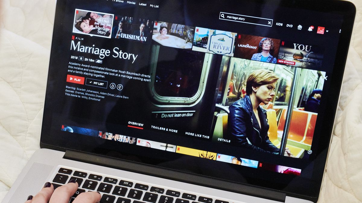 The home screen for the Netflix Inc. original movie "Marriage Story" is displayed on an Apple Inc. laptop computer in an arranged photograph taken in the Brooklyn Borough of New York, U.S., on Thursday, Jan. 2, 2020. Netflix Inc. dominated Golden Globe nominations with 34 total, including four films up for best picture and four series nominated for the top television awards, the Associated Press reported. Photographer: Gabby Jones/Bloomberg via Getty Images