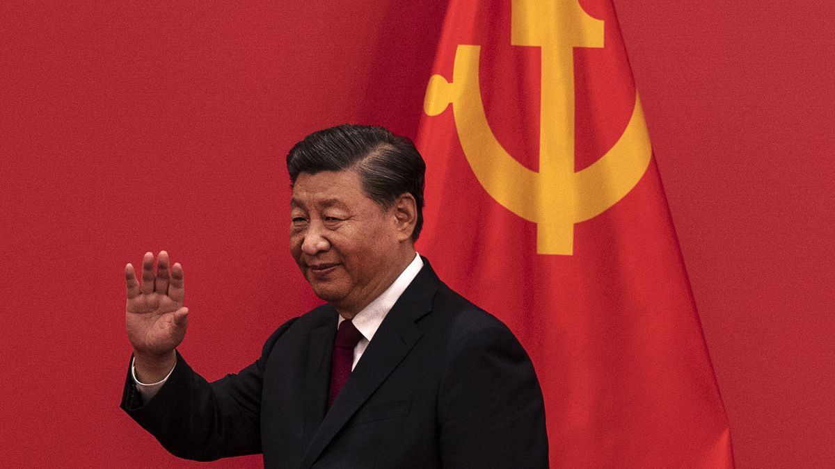 BEIJING, CHINA - OCTOBER 23: General Secretary and Chinese President Xi Jinping waves as he leaves a press event with Chinese and Foreign journalists at The Great Hall of People on October 23, 2022 in Beijing, China. (Photo by Kevin Frayer/Getty Images)