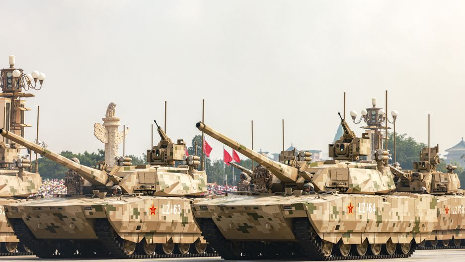 BEIJING, CHINA - SEPTEMBER 03: Type-100 tanks of the ground assault formation are reviewed during the V-Day military parade on September 3, 2025 in Beijing, China. China unveiled its land-, sea-, and air-based strategic forces as the nuclear triad for the first time in Wednesday's V-Day military parade during a grand gathering to commemorate the 80th anniversary of the victory in the Chinese People's War of Resistance against Japanese Aggression and the World Anti-Fascist War. (Photo by VCG/VCG via Getty Images)