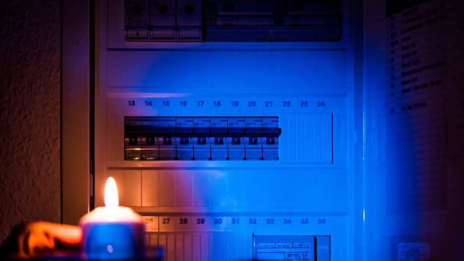 hand with candle in darkness room on electricity switch box. Power outage, blackout, no power concept.
electric, shield, hand, candle, swich, fuse, darkness, room, electricity, switch, box, power, outage, blackout, no, concept, circuit, fire, flame, night, home, light, dark, house, checking, crisis, economy, electrical, green energy, green energy crisis, europe energy crisis, europe