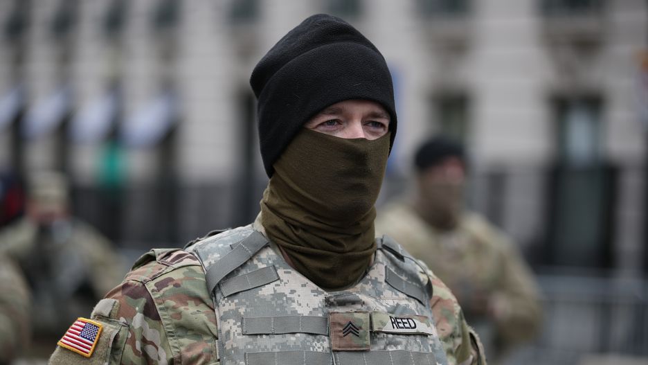 WASHINGTON D.C., USA - JANUARY 20: Security measures are taken near Capitol building and the White House by National Guard soldiers on the inauguration day for President-elect Joe Biden, in Washington, D.C., United States, on January 20, 2021. (Photo by Tayfun Coskun/Anadolu Agency via Getty Images)