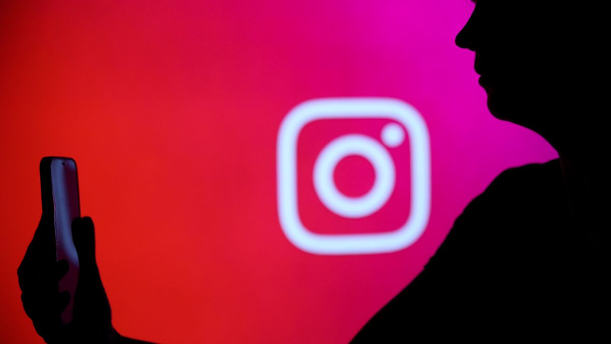 The Instagram logo with a person holding a phone in their hand is seen in Knurow, Poland, on December 26, 2024. (Photo by Klaudia Radecka/NurPhoto via Getty Images)