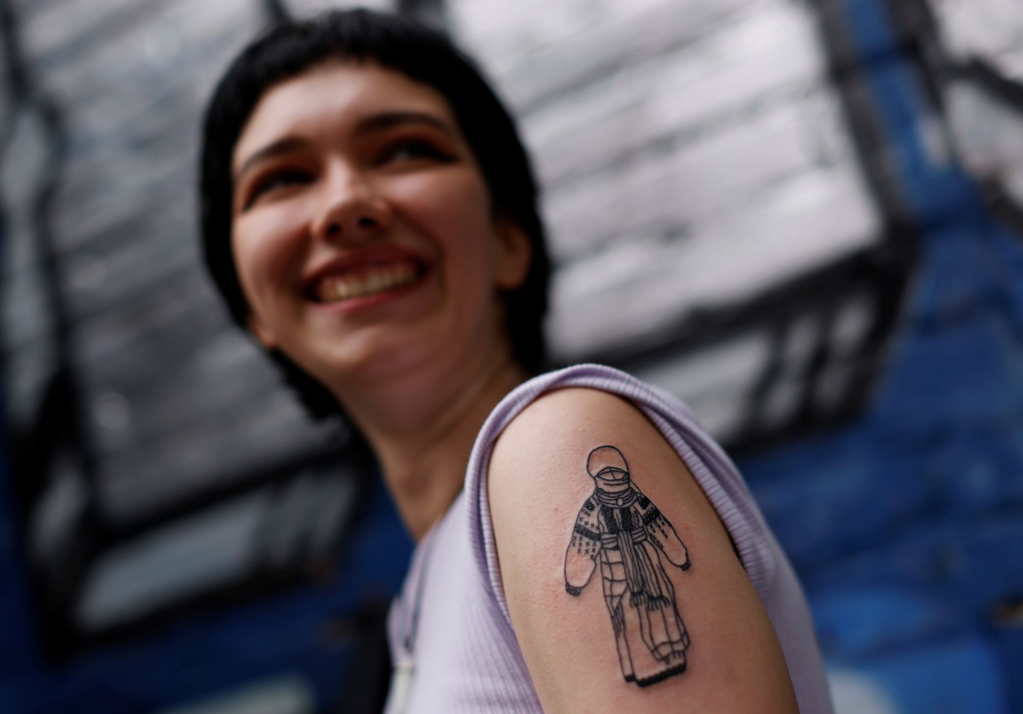Maraton tatuażu w Ukrainie. Młodzi tatuują się, by zebrać fundusze na wojsko 11