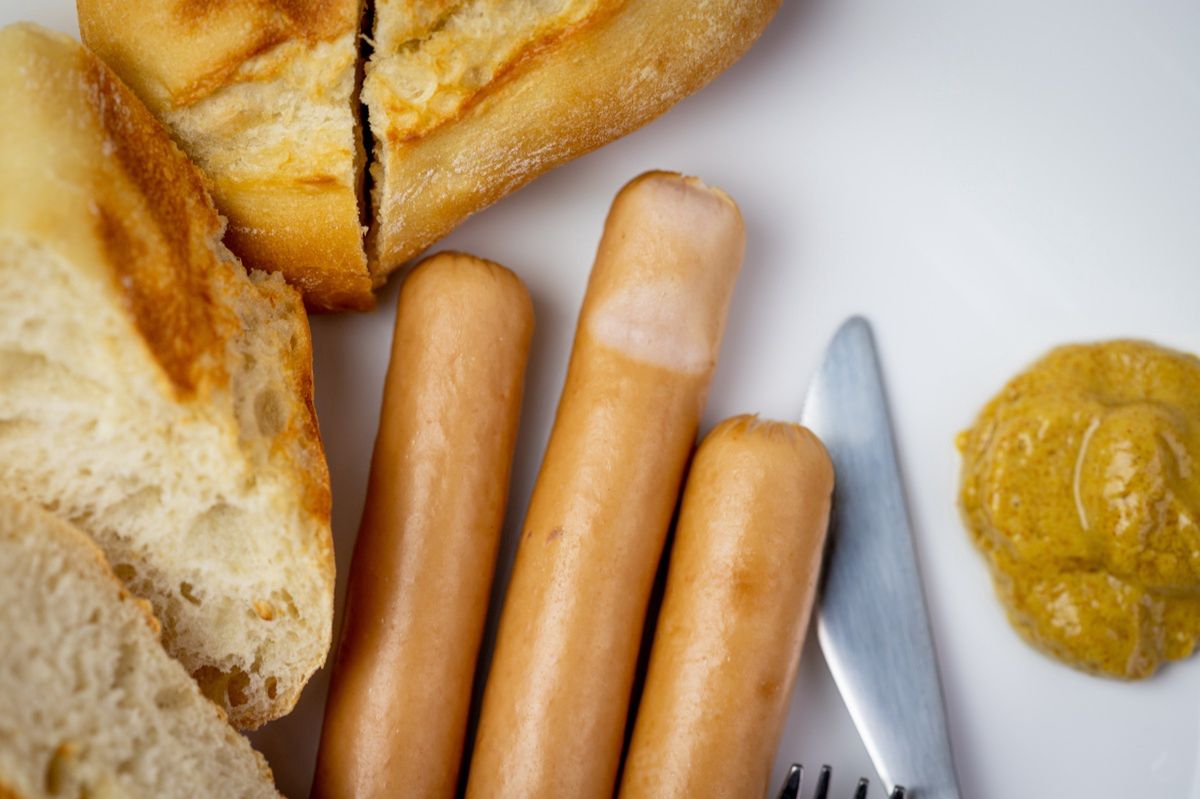 Hot dogs with baguette and mustard