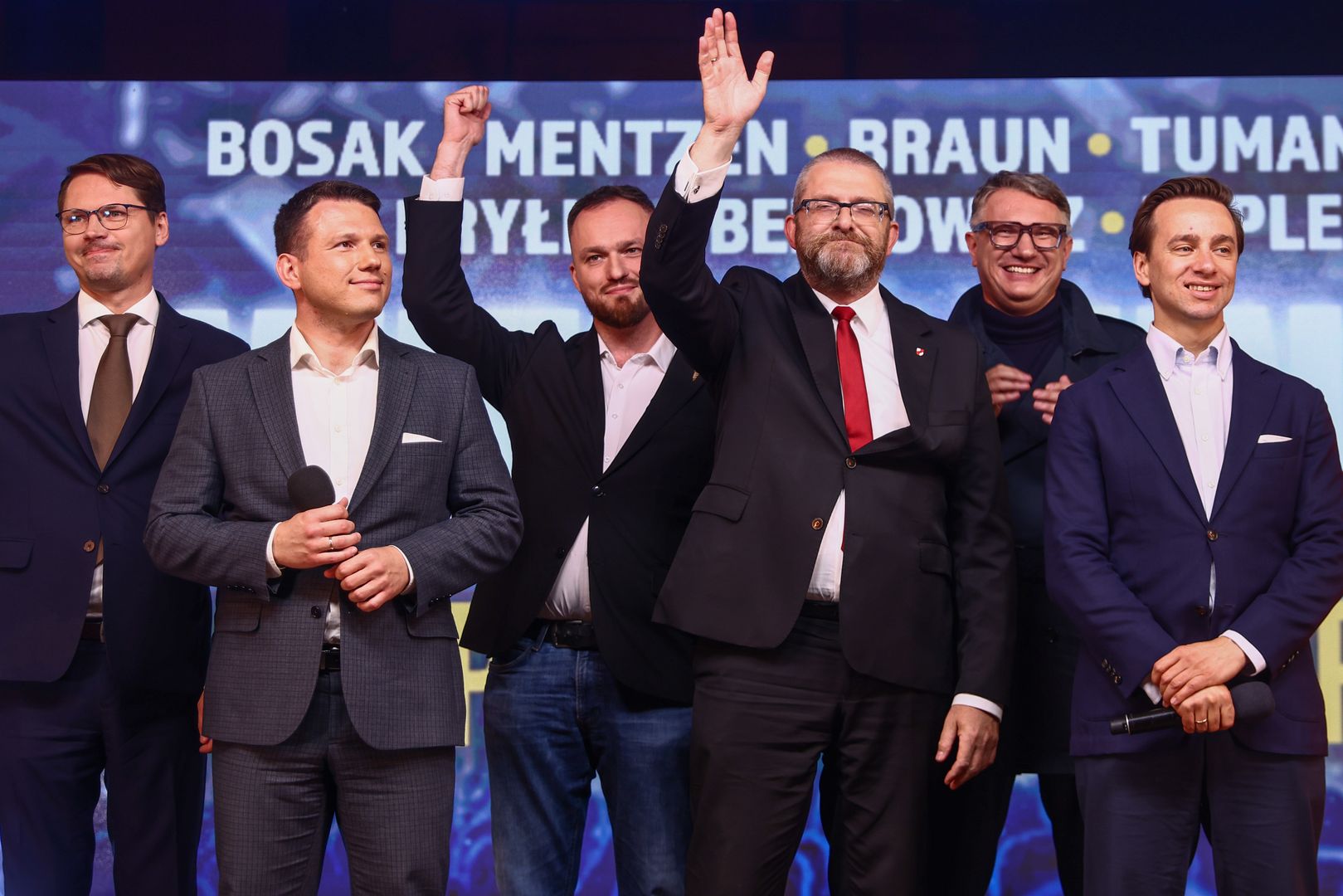 Leaders of the Confederation Liberty and Independence party (Konfederacja), Slawomir Mentzen, Grzegorz Braun, Krzysztof Bosak and other members, are seen during the final election rally in Krakow, Poland on October 13, 2023. This year's parliamentary elections will be held in Poland on October 15th.  (Photo by Beata Zawrzel/NurPhoto via Getty Images)
