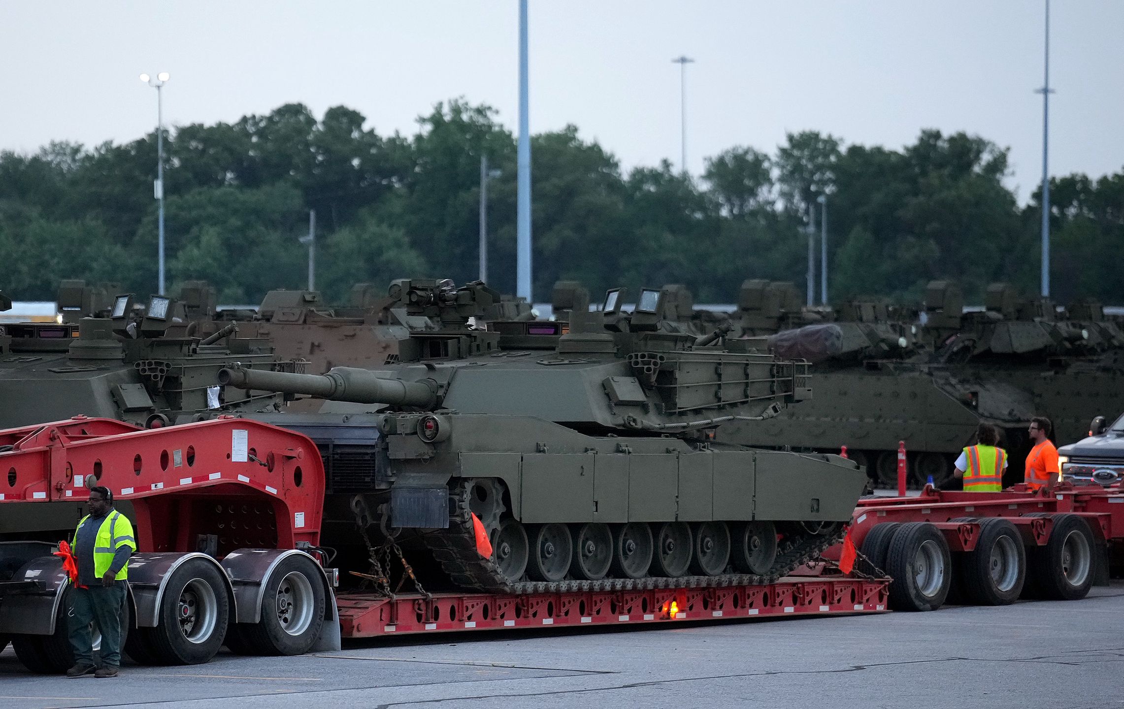 JESSUP, MARYLAND - JUNE 09: Crews prepare to move a M1 Abrams tank by a truck at the CSX rail yard on June 09, 2025 in Jessup, Maryland. Tanks and other heavy military equipment are being transported to Washington, DC for a military parade on June 14 in honor of the U.S. Army’s 250th anniversary, which coincides with President Donald Trump’s birthday and Flag Day. (Photo by Kevin Dietsch/Getty Images)