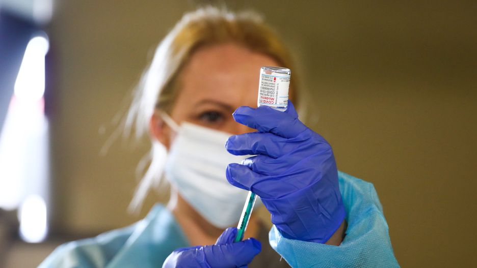 A health worker is dosing a shot of Moderna vaccine on the first day of the opening of the new Covid-19 Vaccination point at Tauron Arena Krakow. Krakow, Poland on May 7, 2021. Up to 2,000 people can be vaccinated daily with Moderna or  AstraZeneca vaccines at the 3rd massive vaccination point in Krakow and 18th in the entire Lesser Poland Voivodeship. (Photo by Beata Zawrzel/NurPhoto via Getty Images)