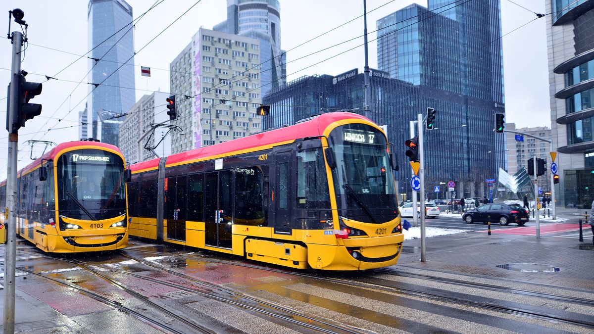 architecture, building, capital, cars, city, city landscape, city traffic, contemporary, downtown, drive, editorial, electric, europe, european, future, glass facades, in the background, infrastructure, line, modern, modern buildings, office buildings, outdoors, passengers, poland, public, railway, road, street, streetcar, tall buildings, technology, tour, tourism, town, tram, tram stop, tramcar, tramway, transport, transportation, travel, urban, vehicle, wagon, warsaw, warsaw tram, winter, yellow