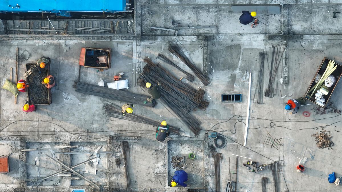 HUAI'AN, CHINA - MARCH 11, 2022 - Workers install aluminum alloy formwork for house construction at a construction site in Huai 'an, East China's Jiangsu Province, March 11, 2022. At present, many real estate builders are beginning to use environmentally friendly and efficient formwork for construction. (Photo credit should read Costfoto/Future Publishing via Getty Images)