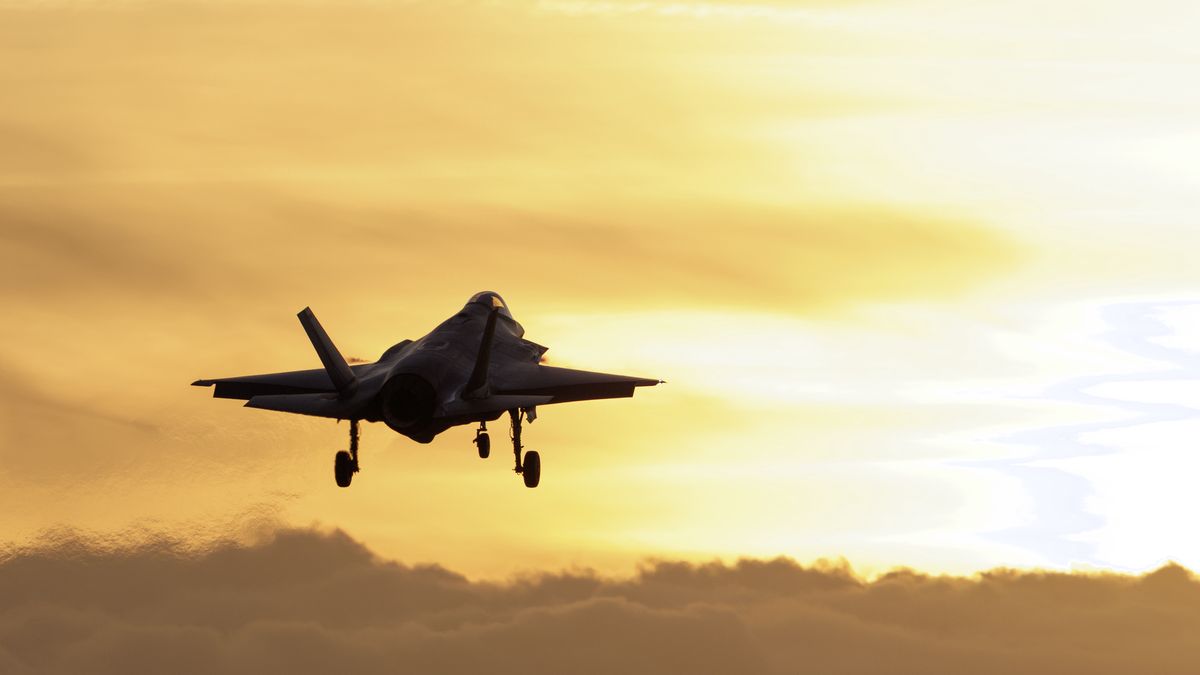 LAKENHEATH, ENGLAND - JANUARY 07: A 5th Generation F-35 lands at RAF Lakenheath at sunset on January 07, 2026 in Mildenhall, England. There have been recent reports have increased United States Air Force aircraft arriving at American bases in England this week, including RAF Fairford in Gloucestershire and at RAF Mildenhall in Suffolk. The reports have come against the backdrop of US officials, including the president, vowing to acquire Greenland, a self-governed territory of Denmark, a NATO member. (Photo by Dan Kitwood/Getty Images)