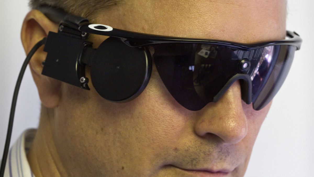 SYLMAR, CA - FEBRUARY 13, 2013 - Second Sight VP of Business Development Brian Mech wearing the glasSYLMAR, CA - FEBRUARY 13, 2013 - Second Sight VP of Business Development Brian Mech wearing the glasses of device called Arguss II Retinal Prosthesis being built at Second Sight Medical Products, Thursday, February 13, 2013, at Second Sight in Sylmar, California. The device is made up of a chip in the eye and umber sunglass variants that translate visual information to the brain. USC and UCLA are about to enjoy the fruits of years of research as the FDA is expected to approve their 'bionic eye' concept.  (Photo by Ricardo DeAratanha/Los Angeles Times via Getty Images)Ricardo DeAratanha