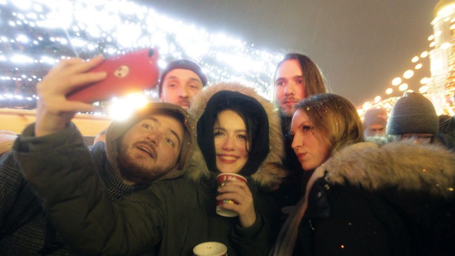 2022 New Year celebration in KyivKYIV, UKRAINE - JANUARY 1, 2022 - People pose for a selfie during the 2022 New Year celebration in Sofiiska Square, Kyiv, capital of Ukraine. (Photo credit should read Yevhen Kotenko/ Ukrinform/Future Publishing via Getty Images)Future Publishingholiday, sofiiska square