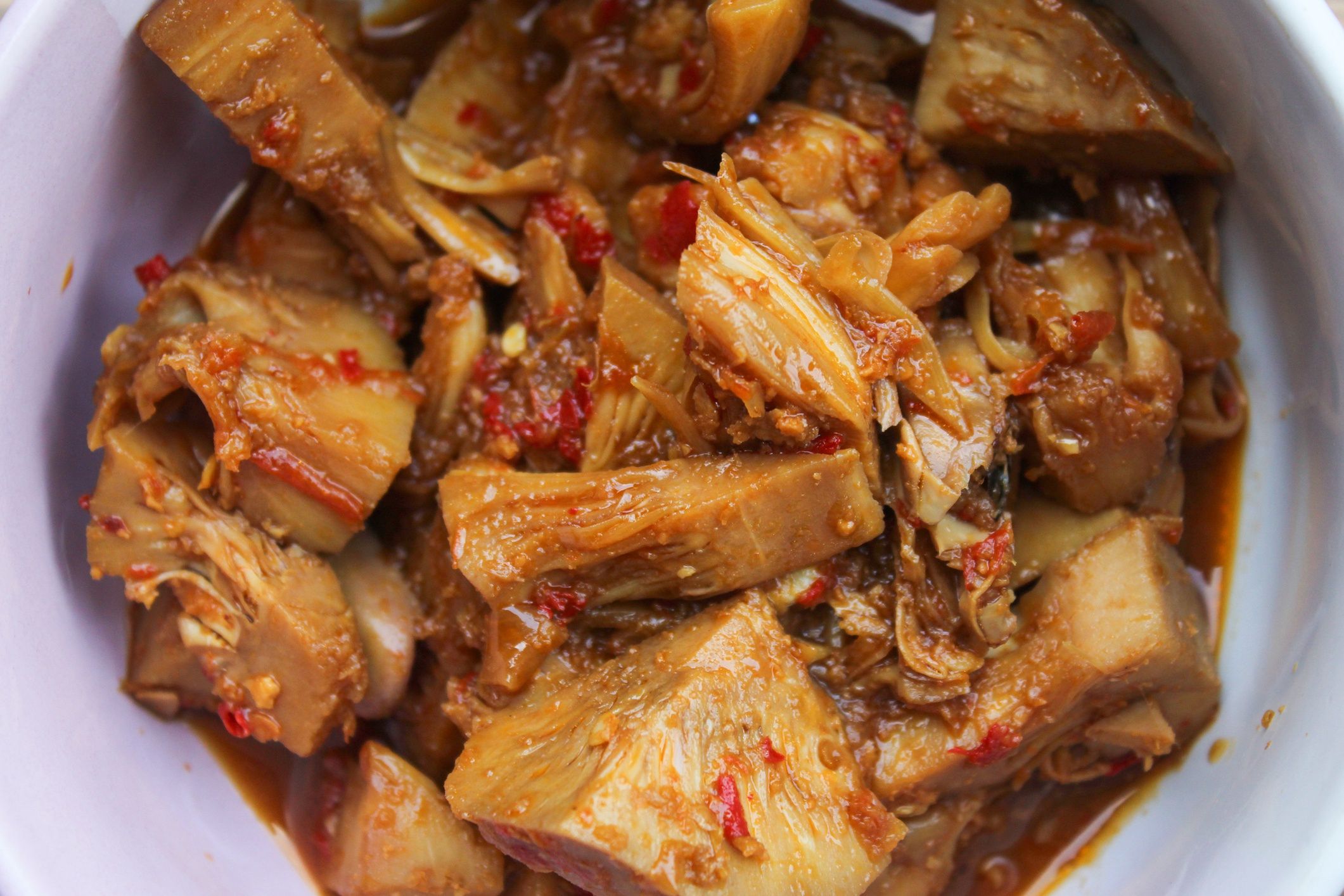 young jackfruit cooked with soy sauce. the taste is sweet and savory
young jackfruit cooked with soy sauce. the taste is sweet and savory
Hendri