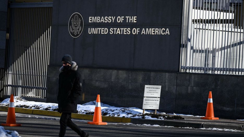arch49A man walks in front of the closed US embassy in Kyiv, on February 15, 2022. - American citizens have already been urged to leave Ukraine, with the West accusing Russia of sending more than 100,000 soldiers to encircle the former Soviet state. (Photo by Aris Messinis / AFP)ARIS MESSINIS