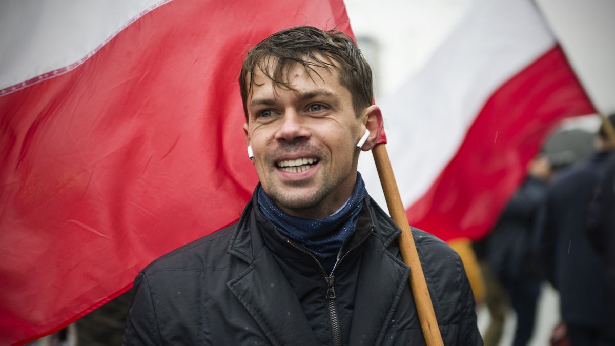 WARSAW, MAZOWIECKIE, POLAND - 2020/10/13: Michal Kolodziejczak waving the Polish flag during the march.
To oppose the so-called "Five for animals" act (Piatka dla zwierzat), Agrounia, the farmers' organisation lead by Michal Kolodziejczak marched through the streets, paralyzing public transport. It is estimated that 70 thousand people took part in the protest. (Photo by Attila Husejnow/SOPA Images/LightRocket via Getty Images)