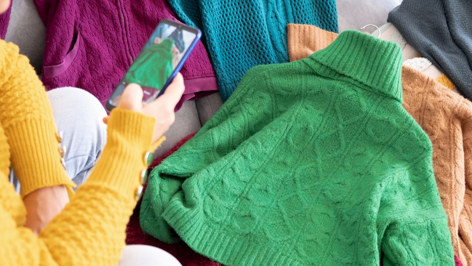 woman, hand, app, at home, business, cell phone, circular fashion, clothes, clothing, collaboration, depop, vertical, fashion app, for sale, home, indoors, lifestyle, listing, listing clothes, making money, mobile phone, phone, reselling, reuse, second hand, selling, vinted, person