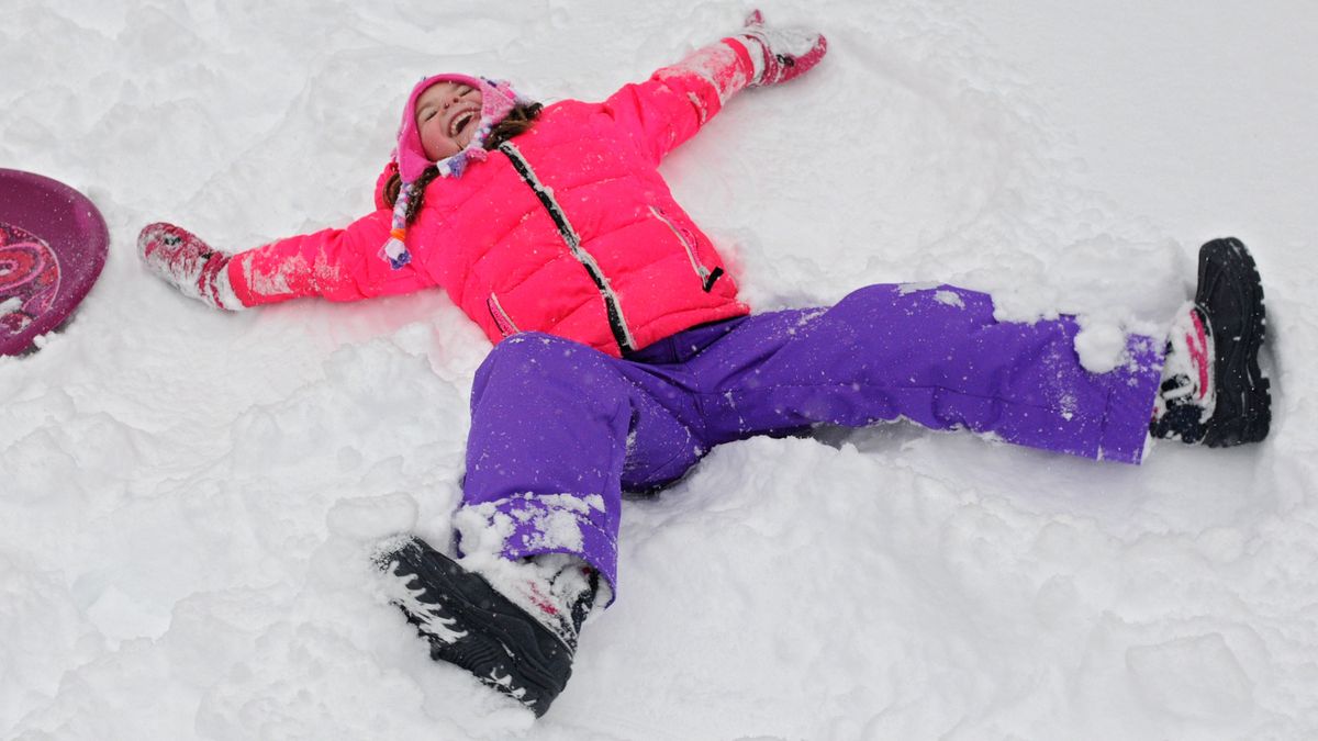 Albany Times Union
Natalie Conaway, 5, of Guilderland takes a break from sledding to makes a snow angel in her front yard during a snow storm on Wednesday, Feb. 5, 2014 in Guilderland, N.Y.  (Photo by Lori Van Buren/Albany Times Union via Getty Images)
Albany Times Union/Hearst Newspa